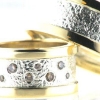 Billede af Ringe 14 kt. + sølv, bredde 10 mm., i damering 8 brill. coffee a 0,02 - 0,03 - 0,04 ct.