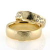Billede af 1 par vielsesringe med afstøbning af fingeraftryk (fingeraftegning) D-ring med 23 brill. 14 kt.