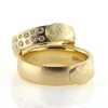 Billede af 1 par vielsesringe med afstøbning af fingeraftryk (fingeraftegning) D-ring med 23 brill. 14 kt.