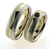 Billede af 1 par vielsesringe, damering fattet sort brill. 0,20 ct.  925s og 18 kt.