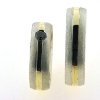 Billede af 1 par vielsesringe, damering fattet sort brill. 0,20 ct.  925s og 18 kt.
