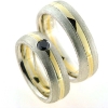 Billede af 1 par vielsesringe, damering fattet sort brill. 0,20 ct.  925s og 18 kt.