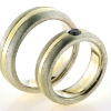 Billede af 1 par vielsesringe, damering fattet sort brill. 0,20 ct.  925s og 18 kt.