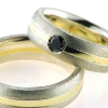 Billede af 1 par vielsesringe, damering fattet sort brill. 0,20 ct.  925s og 18 kt.