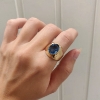 Billede af Ring m. oval syn. sten luk. bund 14 kt..
