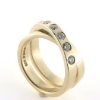 Billede af Dobbelt ring med 7 brill. a 0,10 ct. w/vs 14 kt.