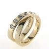 Billede af Dobbelt ring med 7 brill. a 0,10 ct. w/vs 14 kt.