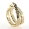 Billede af Dobbelt ring med 7 brill. a 0,10 ct. w/vs 14 kt.