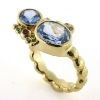Billede af Ring fattet med 10 syn. stene 14 kt.