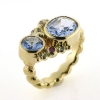 Billede af Ring fattet med 10 syn. stene 14 kt.