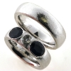 Billede af 1 par vielsesringe, Damering med safirer og oval diamant 14 kt. hvg.