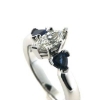 Billede af Ring med diamant marquise cut 0,47 ct. w/vs1 + 2 safirer trillion cut a 0,28 ct. 14 kt. hvg.