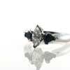 Billede af Ring med diamant marquise cut 0,47 ct. w/vs1 + 2 safirer trillion cut a 0,28 ct. 14 kt. hvg.