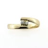 Billede af Ring forskudt, grabbe fatning 2 stk. 2 m/m. syn. stene. 14 kt.