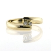 Billede af Ring forskudt, grabbe fatning 2 stk. 2 m/m. syn. stene. 14 kt.