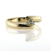 Billede af Ring forskudt, grabbe fatning 2 stk. 2 m/m. syn. stene. 14 kt.