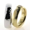 Billede af 1 par vielsesringe, damering fattet med hjerte diamant 14 kt. og 14 kt. hvg.