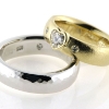 Billede af 1 par vielsesringe, damering fattet med hjerte diamant 14 kt. og 14 kt. hvg.