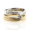 Billede af Dobbelt ring 2 farvet guld, 9 brillanter 14 kt. + 14 kt. hvg.