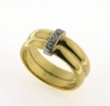 Billede af Ringe, 2 Ringe 14 kt. loddet fast sammen, påloddet bånd 14 kt. hvg., isat 1 brill. a 0,02 w/vs.  