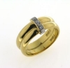 Billede af Ringe, 2 Ringe 14 kt. loddet fast sammen, påloddet bånd 14 kt. hvg., isat 1 brill. a 0,02 w/vs.  