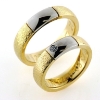 Billede af 1 par vielsesringe med hvidguld, damering fattet med brillant 14 kt.