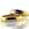 Billede af 1 par vielsesringe med hvidguld, damering fattet med brillant 14 kt.
