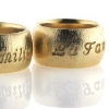Billede af 1 par ringe, nedfræset "La Familia" 14 kt. 