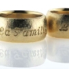 Billede af 1 par ringe, nedfræset "La Familia" 14 kt. 