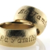 Billede af 1 par ringe, nedfræset "La Familia" 14 kt. 