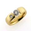 Billede af Ring med brill. 0,63 ct. i hvg. fatning og brill. 0,10 ct. 14 kt.