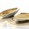 Billede af Vielsesringe 3 farver 14 kt. guld, d. ring isat brill. 7*0,01 + 2*0,005 w/vs. 14 kt.