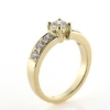 Billede af Ring med brillanter, 0,41 w/vs. + 6 stk. 0,07 w/vs.  14 kt. 4,1 gr.