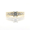 Billede af Ring med brillanter, 0,41 w/vs. + 6 stk. 0,07 w/vs.  14 kt. 4,1 gr.
