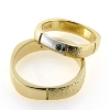 Billede af 1 par ringe, hr. ring br. 5 mm. D-ring med hvg. fattet 1 brill. 0,03 ct. green, 14 kt.