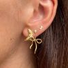 Billede af STINE A Dangling Flow Bow ørering forgyldt sølv m. cz (1 stk.)