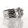 Billede af Ring 3 delt fattet med princess cut 0,40 tw/vs. + 16* 0,015 w/vs. + 18* 0,01 w/vs. 14 kt. hvg.