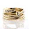 Billede af Dobbelt ring, 9 brillanter 14 kt.