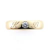 Billede af Ring med bogstaver og brill. 0,25 ct. 14 kt.